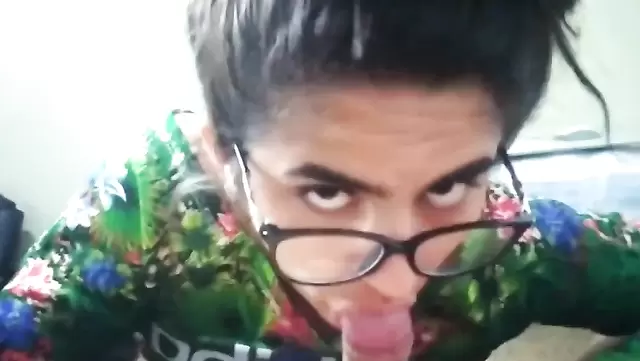 A bespectacled Brazilian girl gives a POV blowjob